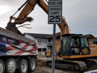 Case excavator loading a truck